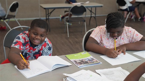 Kids in an afterschool program doing homework